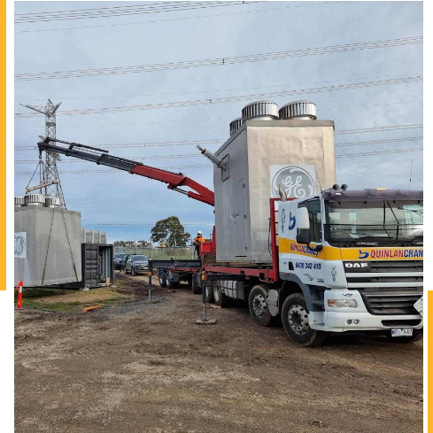 Crane Truck Hauling A GE Concrete Structure
