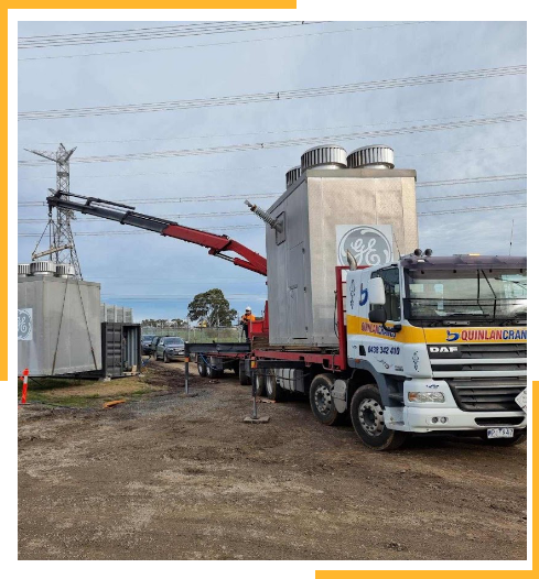 Crane Truck Hauling A GE Concrete Structure