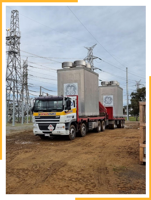 Crane Truck Loading Two GE Concrete Structures