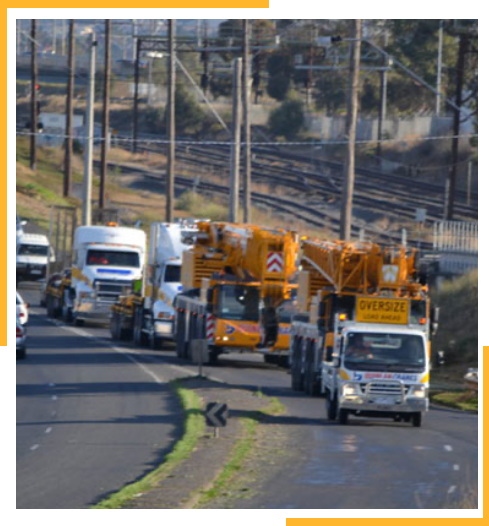 Fleet Of Large Trucks On Road